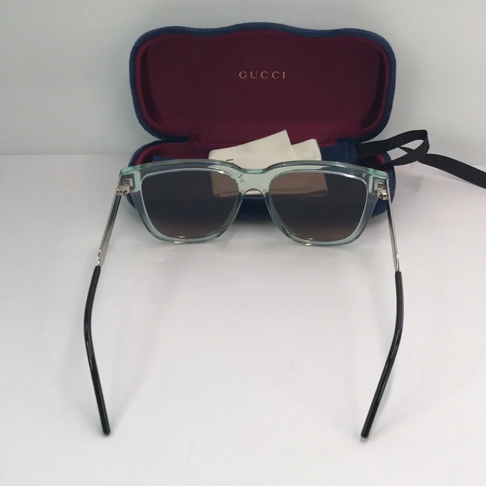 Gucci GG0976S 002 in injected material , in green rectangular/square Sunglasses
